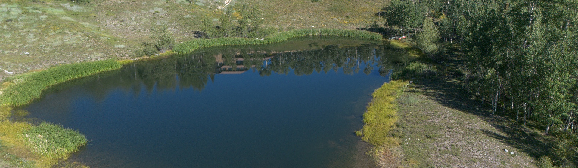 15.3-turkey-creek-telluride-drone-close-lake